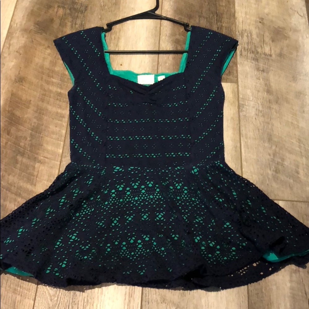 Anthropologie navy and green eyelet peplum shirt